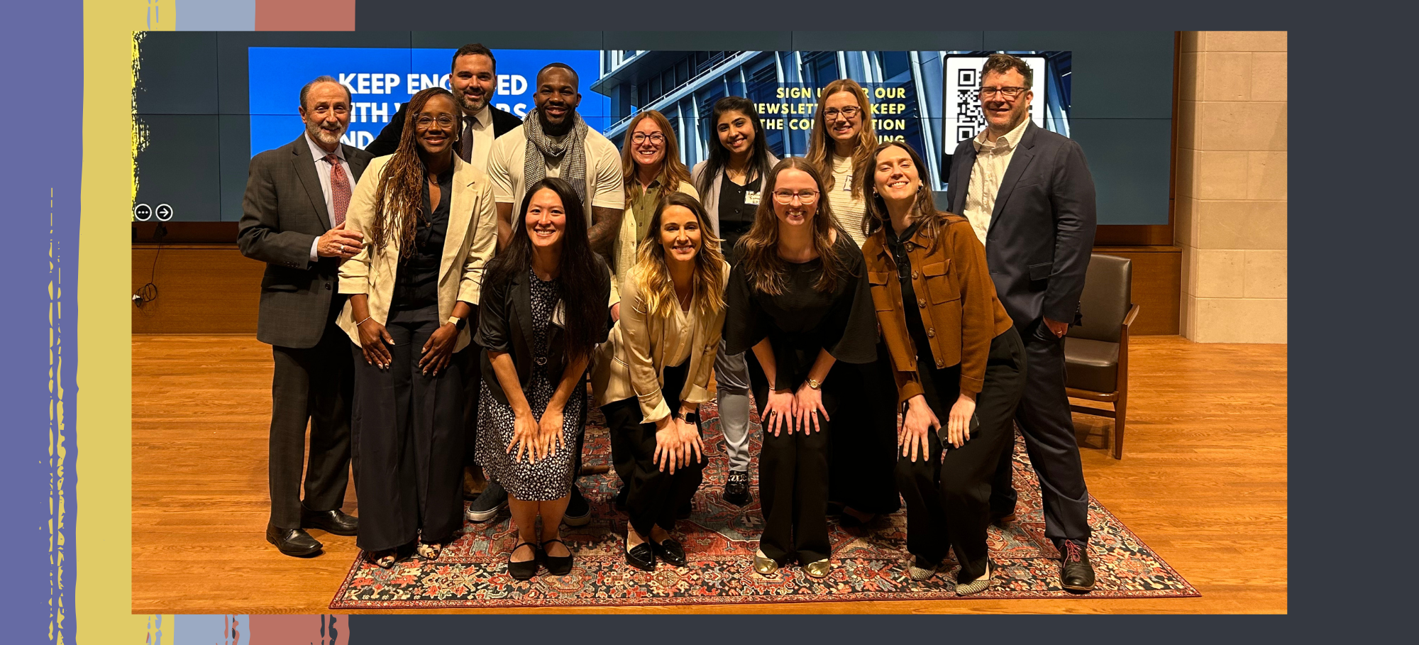 The Center for Youth Justice team in front of a large screen at the Janet Reno Forum