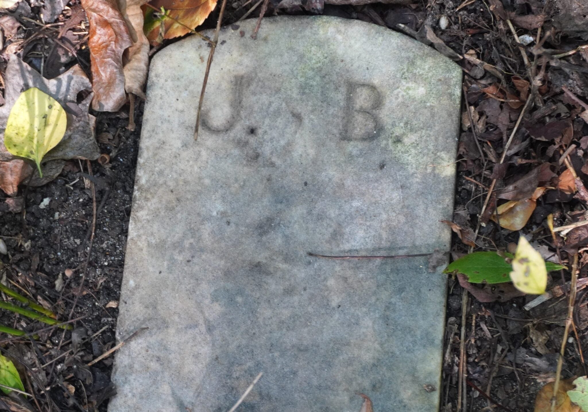 Headstone with J and B engraved