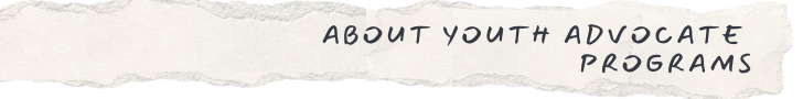 About Youth Advocate Programs text on strip of torn paper