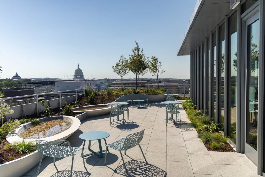 Capitol View Space and balcony of McCourt Building, with view of sky and capitol buildings