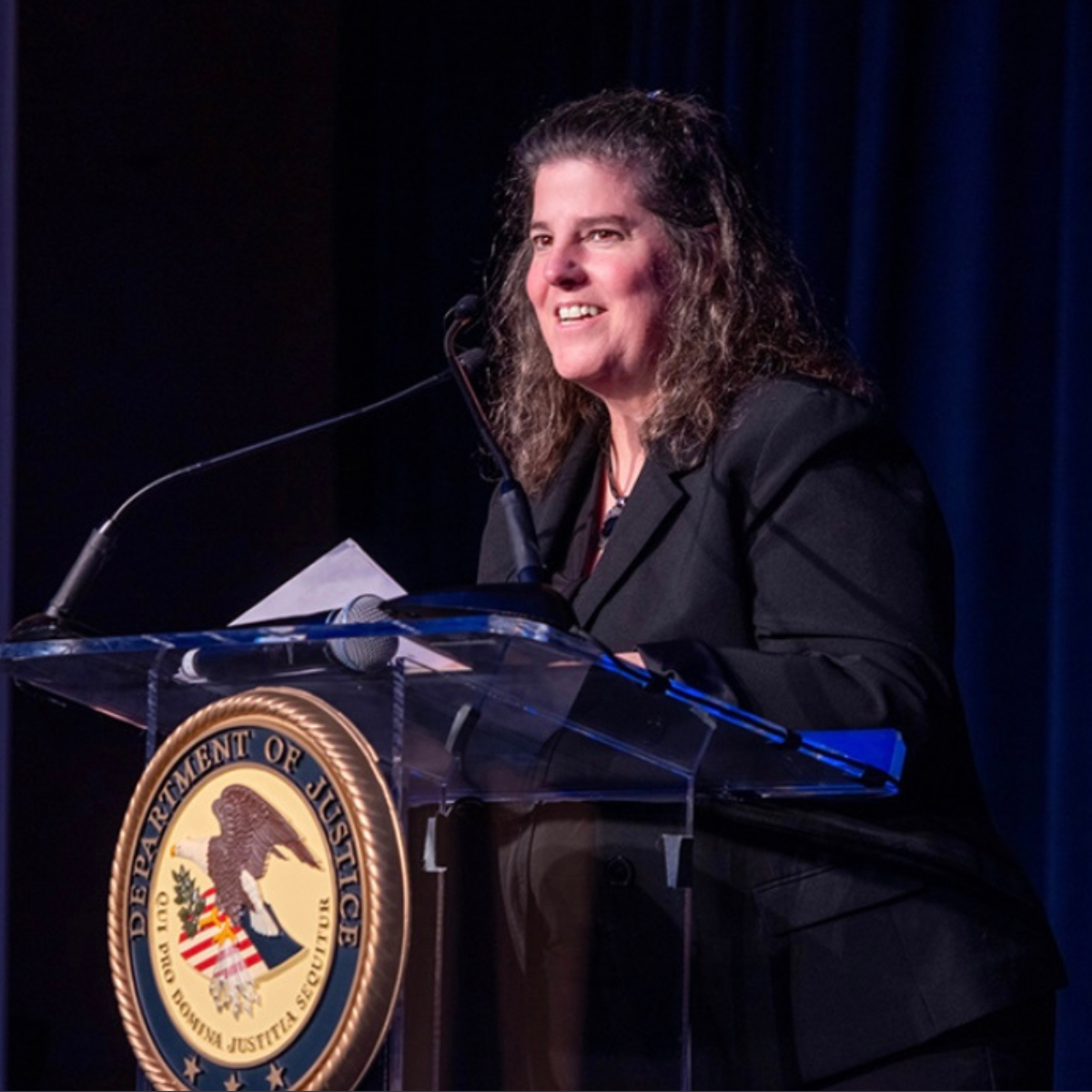 Liz Ryan at podium speaking